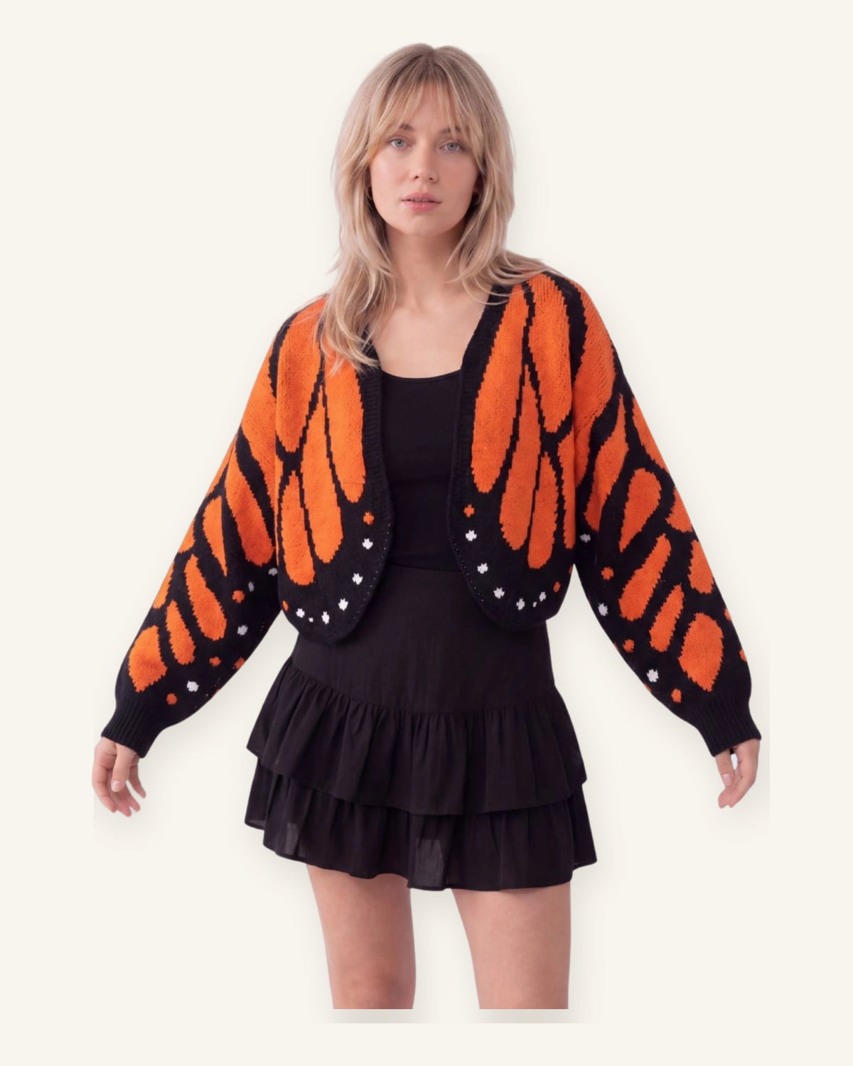 Cadaqués | Cárdigan oversize con diseño de mariposa sobre fondo marfil